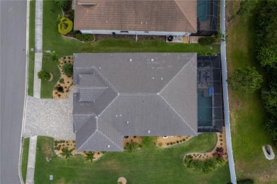 Elegant, beautifully landscaped Lee Wetherington 2-Bedroom on River Wilderness Golf and Country Club in Florida - for sale on GolfHomes.com, golf home, golf lot