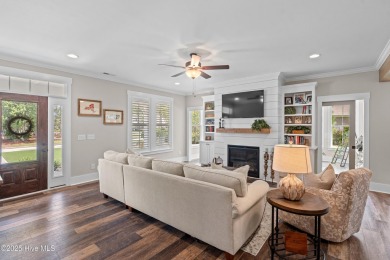 This nearly new residence is situated on a corner lot within the on Members Club At St. James Plantation in North Carolina - for sale on GolfHomes.com, golf home, golf lot