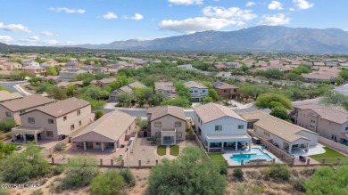 Located in Rancho Vistoso, this Elevation C Plan with Stone sits on The Golf Club at Vistoso in Arizona - for sale on GolfHomes.com, golf home, golf lot