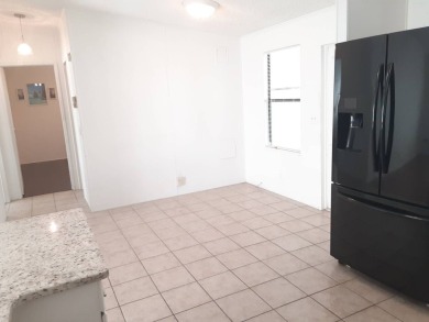 This updated 2 bed / 2 bath is move in ready.   Kitchen has new on Big Cypress Golf and Country Club in Florida - for sale on GolfHomes.com, golf home, golf lot