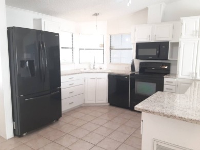 This updated 2 bed / 2 bath is move in ready.   Kitchen has new on Big Cypress Golf and Country Club in Florida - for sale on GolfHomes.com, golf home, golf lot