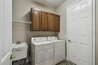 One or more photo(s) has been virtually staged. Located on a on Stonegate Golf Club in Florida - for sale on GolfHomes.com, golf home, golf lot