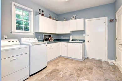 Located at the end of a quiet cul-de-sac on the 10th hole of the on Fords Colony Country Club in Virginia - for sale on GolfHomes.com, golf home, golf lot
