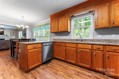 Welcome to your dream home in the highly sought-after Corbin on Corbin Hills Golf Club in North Carolina - for sale on GolfHomes.com, golf home, golf lot