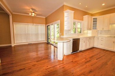 Welcome Home to Golden Eagle's Finest! Nestled within the on Golden Eagle Country Club in Florida - for sale on GolfHomes.com, golf home, golf lot