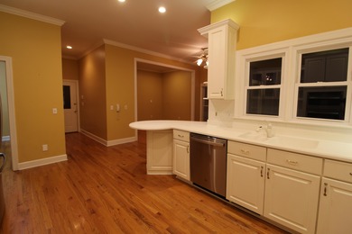 Welcome Home to Golden Eagle's Finest! Nestled within the on Golden Eagle Country Club in Florida - for sale on GolfHomes.com, golf home, golf lot