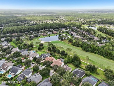 Gorgeous pool home on the golf course in desirable St Johns Golf on St. Johns Golf and Country Club in Florida - for sale on GolfHomes.com, golf home, golf lot