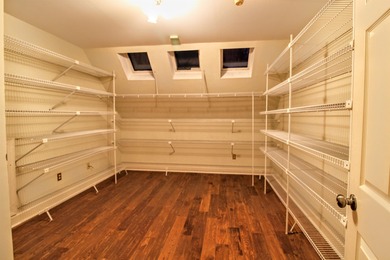 Welcome Home to Golden Eagle's Finest! Nestled within the on Golden Eagle Country Club in Florida - for sale on GolfHomes.com, golf home, golf lot