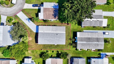 HONEY STOP THE CAR! THIS LAND-OWNED HOME HAS IT ALL! Scraped on Savanna Golf Club in Florida - for sale on GolfHomes.com, golf home, golf lot