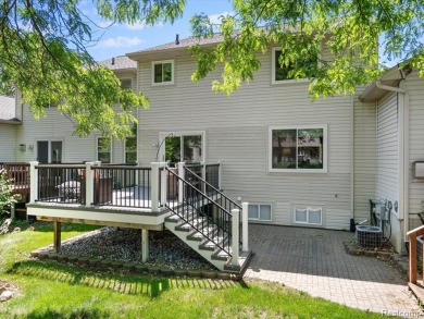 Discover elegant living in this Waterford Fairways condo on White Lake Oaks Golf Course in Michigan - for sale on GolfHomes.com, golf home, golf lot