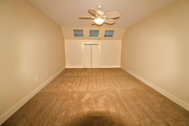 Welcome Home to Golden Eagle's Finest! Nestled within the on Golden Eagle Country Club in Florida - for sale on GolfHomes.com, golf home, golf lot