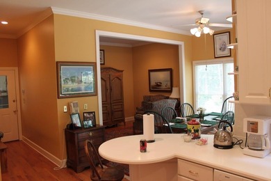 Welcome Home to Golden Eagle's Finest! Nestled within the on Golden Eagle Country Club in Florida - for sale on GolfHomes.com, golf home, golf lot