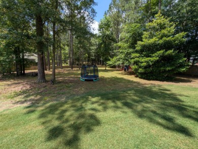 This beautiful, well maintained, 2,476 sqft home features a on Grand National Golf Course in Alabama - for sale on GolfHomes.com, golf home, golf lot