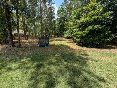 This beautiful, well maintained, 2,476 sqft home features a on Grand National Golf Course in Alabama - for sale on GolfHomes.com, golf home, golf lot
