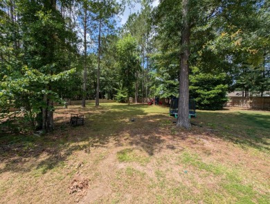 This beautiful, well maintained, 2,476 sqft home features a on Grand National Golf Course in Alabama - for sale on GolfHomes.com, golf home, golf lot