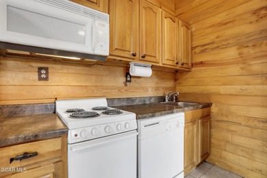 Welcome to your high-country hideaway-where the Rockies are your on Headwaters Golf Course At Granby Ranch in Colorado - for sale on GolfHomes.com, golf home, golf lot