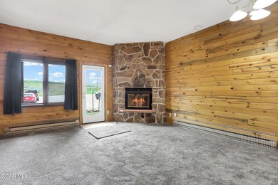 Welcome to your high-country hideaway-where the Rockies are your on Headwaters Golf Course At Granby Ranch in Colorado - for sale on GolfHomes.com, golf home, golf lot