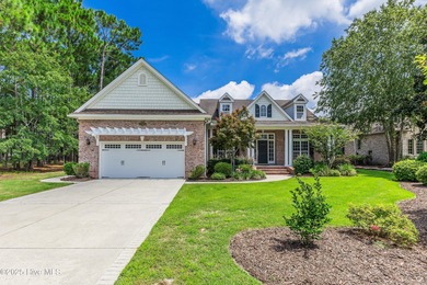 This elegant all-brick, one-level home is perfectly situated in on Reserve Club At St James Plantation in North Carolina - for sale on GolfHomes.com, golf home, golf lot