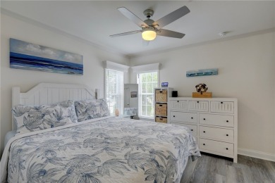 2022 Model home features accordion hurricane shutters, double on Barefoot Bay Golf Course in Florida - for sale on GolfHomes.com, golf home, golf lot