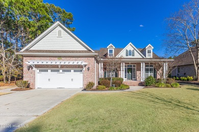 This elegant all-brick, one-level home is perfectly situated in on Reserve Club At St James Plantation in North Carolina - for sale on GolfHomes.com, golf home, golf lot