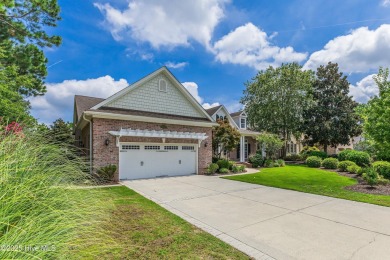 This elegant all-brick, one-level home is perfectly situated in on Reserve Club At St James Plantation in North Carolina - for sale on GolfHomes.com, golf home, golf lot