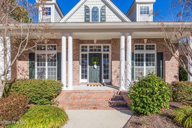 This elegant all-brick, one-level home is perfectly situated in on Reserve Club At St James Plantation in North Carolina - for sale on GolfHomes.com, golf home, golf lot