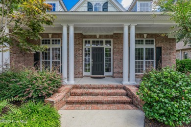 This elegant all-brick, one-level home is perfectly situated in on Reserve Club At St James Plantation in North Carolina - for sale on GolfHomes.com, golf home, golf lot