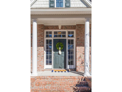 This elegant all-brick, one-level home is perfectly situated in on Reserve Club At St James Plantation in North Carolina - for sale on GolfHomes.com, golf home, golf lot