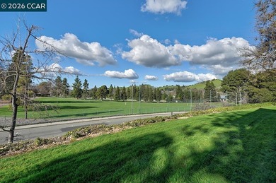 This reconfigured end unit Carmel features two bedrooms and two on Rossmoor Golf Course in California - for sale on GolfHomes.com, golf home, golf lot