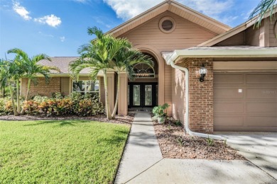 Single-Story 5-Bedroom Pool Home in Hunter's Green Golf on Hunters Green Country Club in Florida - for sale on GolfHomes.com, golf home, golf lot