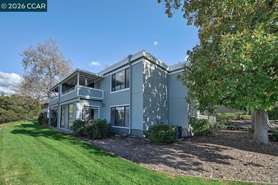 This reconfigured end unit Carmel features two bedrooms and two on Rossmoor Golf Course in California - for sale on GolfHomes.com, golf home, golf lot