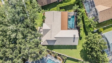 Single-Story 5-Bedroom Pool Home in Hunter's Green Golf on Hunters Green Country Club in Florida - for sale on GolfHomes.com, golf home, golf lot