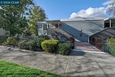 This reconfigured end unit Carmel features two bedrooms and two on Rossmoor Golf Course in California - for sale on GolfHomes.com, golf home, golf lot