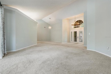Single-Story 5-Bedroom Pool Home in Hunter's Green Golf on Hunters Green Country Club in Florida - for sale on GolfHomes.com, golf home, golf lot