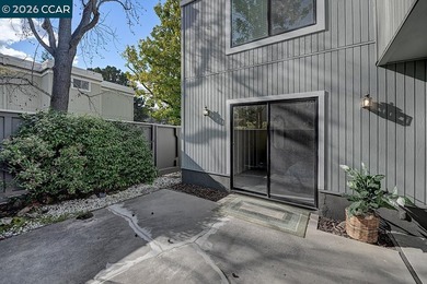 This reconfigured end unit Carmel features two bedrooms and two on Rossmoor Golf Course in California - for sale on GolfHomes.com, golf home, golf lot