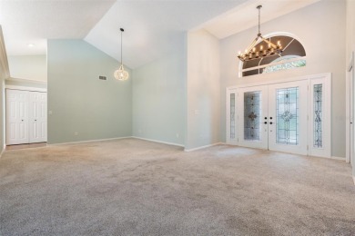 Single-Story 5-Bedroom Pool Home in Hunter's Green Golf on Hunters Green Country Club in Florida - for sale on GolfHomes.com, golf home, golf lot