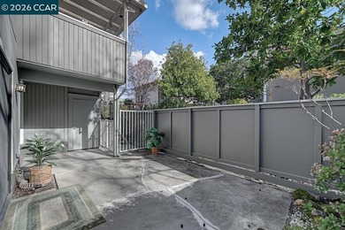 This reconfigured end unit Carmel features two bedrooms and two on Rossmoor Golf Course in California - for sale on GolfHomes.com, golf home, golf lot