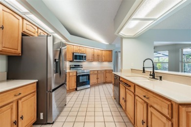 Single-Story 5-Bedroom Pool Home in Hunter's Green Golf on Hunters Green Country Club in Florida - for sale on GolfHomes.com, golf home, golf lot