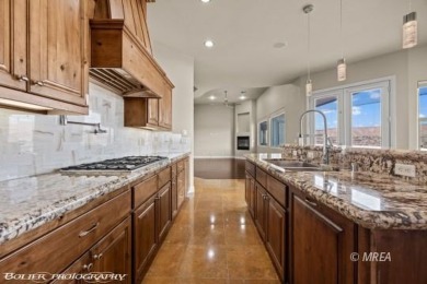 Envelop yourself in luxury. Located in the beautiful gated on Falcon Ridge Golf Course in Nevada - for sale on GolfHomes.com, golf home, golf lot