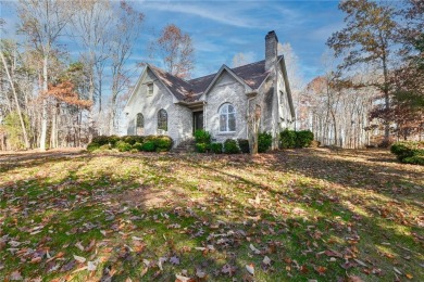 This all-brick home, nestled on just under an acre overlooks on Plantation Golf Club in North Carolina - for sale on GolfHomes.com, golf home, golf lot