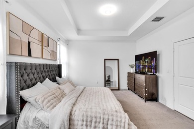 Gorgeous two-story single-family home built in 2019, located in on Woodlands Country Club in Florida - for sale on GolfHomes.com, golf home, golf lot