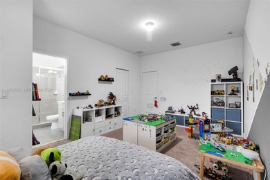 Gorgeous two-story single-family home built in 2019, located in on Woodlands Country Club in Florida - for sale on GolfHomes.com, golf home, golf lot