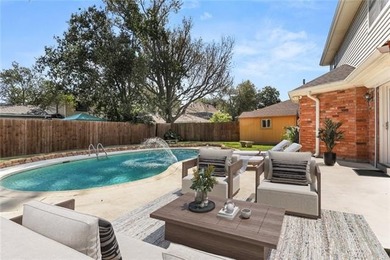 Dive into Kenner living with a sparkling pool and plenty of on Chateau Golf and Country Club in Louisiana - for sale on GolfHomes.com, golf home, golf lot