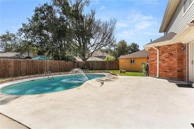 Dive into Kenner living with a sparkling pool and plenty of on Chateau Golf and Country Club in Louisiana - for sale on GolfHomes.com, golf home, golf lot