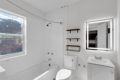 Gorgeous two-story single-family home built in 2019, located in on Woodlands Country Club in Florida - for sale on GolfHomes.com, golf home, golf lot