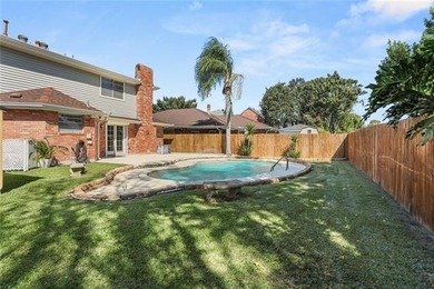 Dive into Kenner living with a sparkling pool and plenty of on Chateau Golf and Country Club in Louisiana - for sale on GolfHomes.com, golf home, golf lot