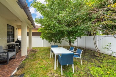 Gorgeous two-story single-family home built in 2019, located in on Woodlands Country Club in Florida - for sale on GolfHomes.com, golf home, golf lot