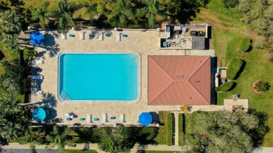 Welcome to El Pasado Condominiums, a quiet, well-maintained on Tarpon Woods Golf Club in Florida - for sale on GolfHomes.com, golf home, golf lot