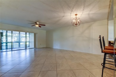 Welcome to El Pasado Condominiums, a quiet, well-maintained on Tarpon Woods Golf Club in Florida - for sale on GolfHomes.com, golf home, golf lot
