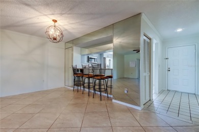 Welcome to El Pasado Condominiums, a quiet, well-maintained on Tarpon Woods Golf Club in Florida - for sale on GolfHomes.com, golf home, golf lot